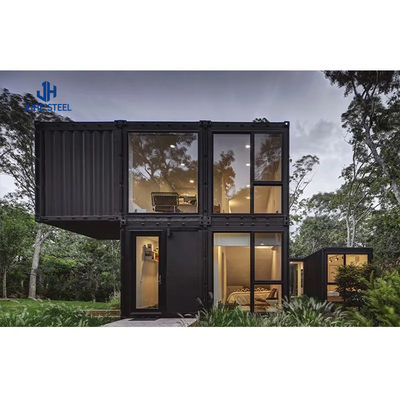Home Prefab Container House with Solid H-shape Steel Beam and Sandwich Panel Door হোম প্রিফ্যাব কন্টেইনার হাউস সলিড এইচ-আকারের স্টিল বিম এবং স্যান্ডউইচ প্যানেল ডোর সহ